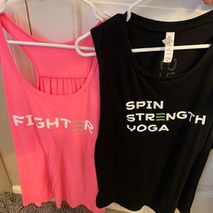2 XL SPENGA tank tops.  Both are thin and flowy!  They have been worn once.